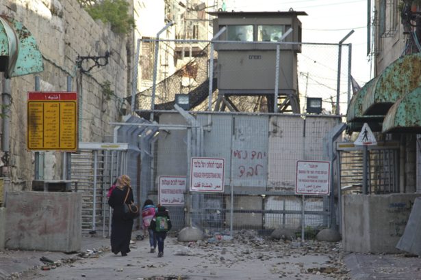Palestinians in Hebron say Israeli forces strip-searched them on their way home