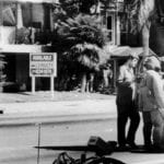 Members of the bomb squad prepare to examine the wrecked offices of the American-Arab Anti-Discrimination Committee offices in Santa Ana, Calif., in 1985. 