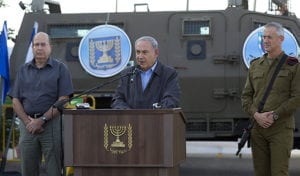 PM Netanyahu at press conference with Defense Minister Moshe Ya'alon at Yehuda territorial brigade, during Operation Brothers Keeper