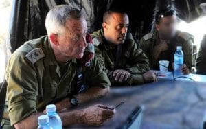 Then IDF Chief of Staff Benny Gantz (L) (now Alternate Prime Minister of Israel and Minister of Defense) visits IDF soldiers as they take part in an operation to locate three Israeli teens kidnapped near the West Bank city of Hebron on June 24, 2014.