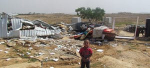 A boy in the Bedouin refugee community of Um al Khayr in the South Hebron Hills where large scale home demolitions by Israeli authorities took place.