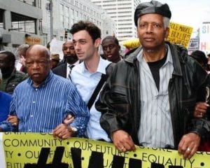 Ossoff Campaign photo of Ossoff marching in 2017 with John Lewis, left, and Hank Johnson. (NYT/Ossoff Campaign)