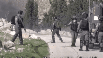 Israeli soldiers cheer after shooting Palestinian man