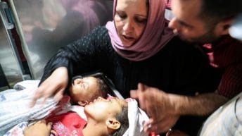 BREAKING:  Israeli airstrikes on Gaza kill 21, including 9 children