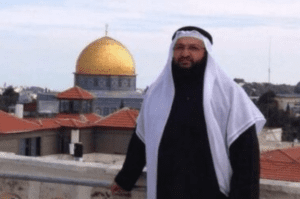 Fadi Abu Shkheidem in front of Al Aqsa mosque