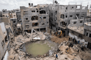 A crater full of water and sewage remains where the home of Ramez al-Masri was destroyed by an air-strike prior to a cease-fire reached after an 11-day war between Gaza’s Hamas rulers and Israel, Sunday, May 23, 2021, in Beit Hanoun, the northern Gaza Strip.
