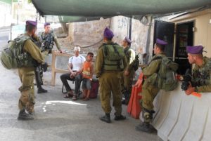 Does Mike Pence know Israel's policies toward Palestinians in Israel? (Pictured: Israeli troops in Hebron detain a Palestinian 5-year old child, blindfold his father, after the child allegedly threw a stone that according to the IDF, hit the tire of a car belonging to a settler, July 11, 2013.)