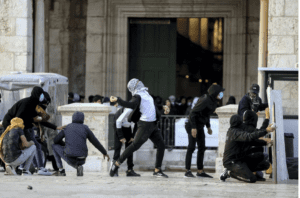 Stone-throwing at the Temple Mount, Jerusalem, last month.
