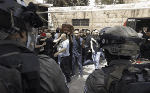 Israeli police attack the funeral of journalist Shireen Abu Akleh at Saint Joseph Hospital in Jerusalem, May 13, 2022. 
