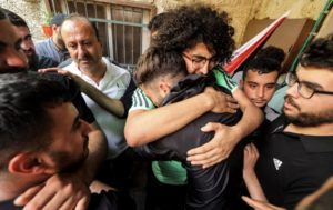 Family of Ali Harb mourn his death after a settler stabbed him in the heart.
