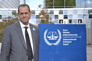 Anton Abu Akleh standing outside the offices of the International Criminal Court in the Hague, Netherlands, Sept. 20, 2022.