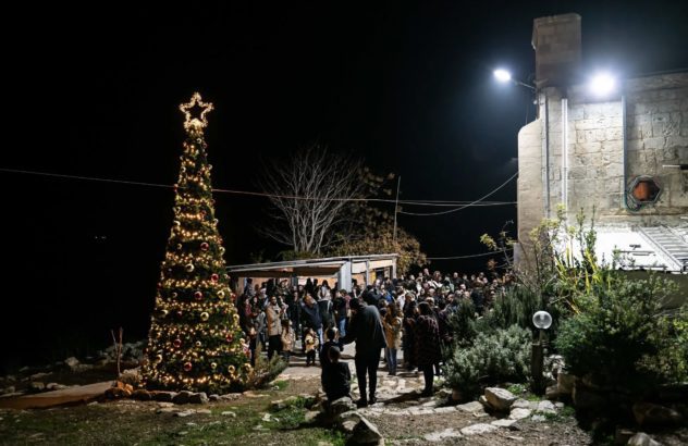 A Christmas Tree Brings Life to a Destroyed Palestinian Village