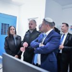 National Security Minister Itamar Ben Gvir (center) listens to Israel Prison Service chief Katy Perry (left) during a visit to Nafha Prison, January 6, 2023