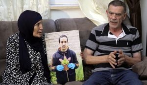 The parents of Eyad Hallaq, an autistic Palestinian man killed by an Israeli Border Police officer in 2020.