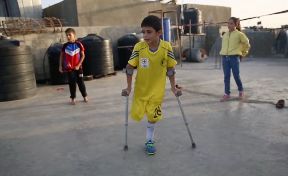 Gaza child amputee plays soccer with crutches