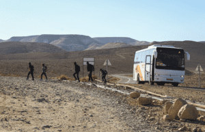 Bedouin children from the unrecognized community of Al-Bqea’ah, in the Negev desert, return home from school in a government-planned township for Bedouins on Jan. 17, 2023.