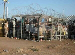 Taybeh checkpoint in the occupied West Bank, where Palestinians endure a crowded cage while they wait to be searched and humiliated.