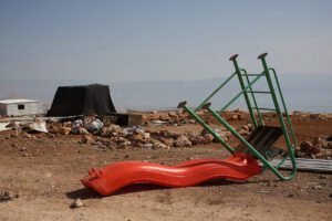 An overturned slide seen in the Palestinian village of Wadi al-Siq.