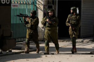 Israeli soldiers are seen during an army operation, in the Jenin refugee camp, West Bank, Tuesday