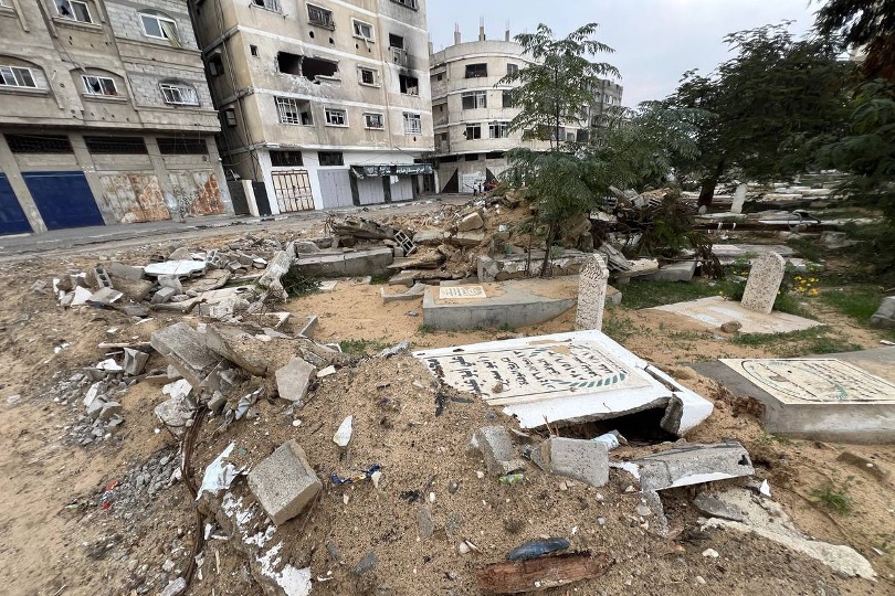 A view of destroyed the Fallujah cemetery, which it used as a headquarters by Israel military, and damaged buildings as Israeli attacks continue on Gaza Strip, on December 14, 2023.