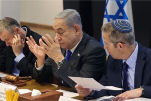 Netanyahu, centre, chairs a cabinet meeting at the Kirya, which houses the Israeli Ministry of Defense, in Tel Aviv