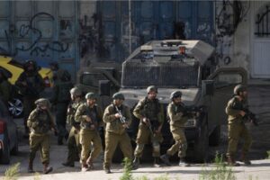 Israeli forces deploy during a raid on Balata, a Palestinian refugee camp in Nablus