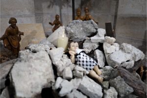 A view of the Evangelical Lutheran Christmas Church's Nativity scene in Bethlehem. This year, it portrays a baby Christ born under rubble and wrapped up in a Palestinian keffiyeh.