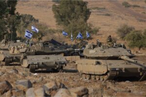 Israeli Merkava tanks positioned in the upper Galilee in northern Israel near the border with Lebanon on October 11