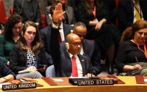 US Ambassador Alternate Representative of the US for Special Political Affairs in the United Nations Robert A. Wood raises his hand during a United Nations Security Council meeting on Gaza, at UN headquarters in New York City on December 8, 2023.