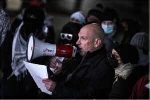 Former state department official Josh Paul speaks at a rally calling for a ceasefire outside the White House in December.