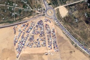Satellite images taken on February 21 showed more than a thousand aid trucks lined up waiting to enter the Rafah land crossing in Egypt, most of them waiting inside the logistics zone being established east of the crossing.