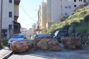 Large boulders block the entry and exit of cars outside Beit Jala, occupied West Bank.