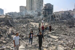 Palestinians inspected the destruction in the Al-Rimal neighborhood of Gaza City soon after the start of the war.