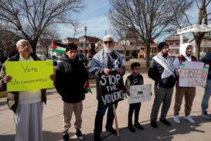 Supporters of the campaign to vote ‘uncommitted’ hold a rally in support of Palestinians in Gaza, ahead of Michigan’s Democratic presidential primary election in Hamtramck, Michigan, US, on Sunday
