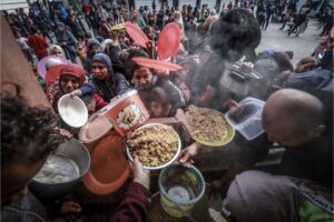 People gathered to receive food in Rafah, as Gazans face widespread hunger.