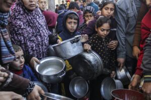 Palestinians break the fast (iftar) under difficult conditions in Jabalia refugee camp on the first day of the Muslim holy month of Ramadan in Gaza on March 11, 2024.