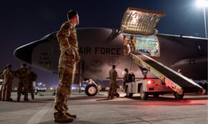 U.S. Air Force personnel unload a KC-135 Stratotanker at an undisclosed location, designated by the military as within the U.S. Central Command “area of responsibility,” on Oct. 23, 2023