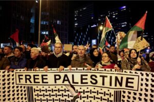 People take part in a demonstration in support of Palestinians in Gaza, in Berlin, Germany, on November 10, 2023