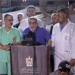 Palestinian surgeon Ghassan Abu-Sittah speaks to reporters outside Al-Ahli Hospital in the Gaza Strip.