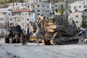 Israeli army excavators take position in Tulkarem, in the Israeli-occupied West Bank
