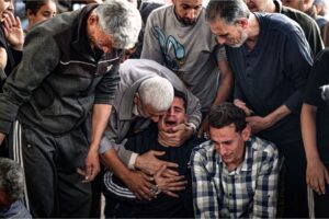 Palestinians mourn relatives killed in Israeli air strikes on Rafah