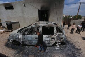 A view of heavily damaged car as Jewish settlers reportedly set fire to Palestinian homes and vehicles in Qusra town in Nablus, West Bank on 14 April, 2024