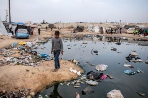Palestinians who take refuge in a tent camp in Rafah face the risk of epidemics due to uncollected rubbish and accumulated sewage water, Friday