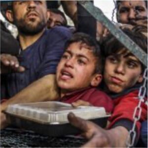 Crowd of starving Palestinians, including children, wait to receive food distributed by charity organizations amid Israel’s blockade as the situation dramatically deteriorates in Jabalia refugee camp, Gaza on March 27, 2024