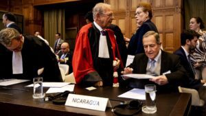 Nicaragua's Ambassador to The Netherlands Carlos Jose Arguello Gomez (R) attends a hearing at the International Court of Justice (ICJ) 8 April