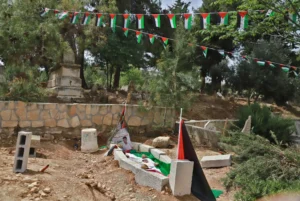 The fresh grave of 17-year-old Omar Hamed, shot dead by settlers at Beitin.