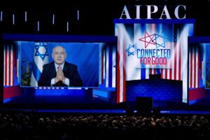 Israeli Prime Minister Benjamin Netanyahu speaks on a video from Israel to the 2019 AIPAC policy conference, at the Washington Convention Center in Washington, March 26, 2019.