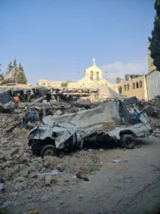 A photo taken by A. showing damage to the area surrounding the Greek Orthodox Church of Saint Porphyrius in Gaza City.