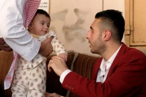 Amer Abu Halil, with his son.