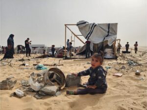 A Palestinian child amid the rubble after Israel bombed Palestinian tents in Rafah, May 27, 2024